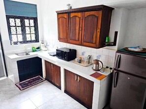 Fridge, microwave, electric kettle, toaster