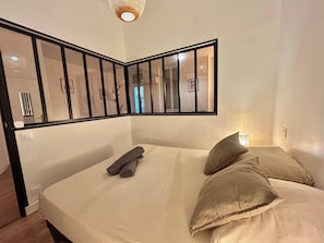 1 bedroom, desk, iron/ironing board, travel crib