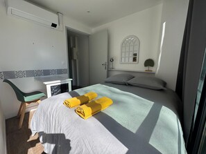 2 bedrooms, desk, iron/ironing board, travel cot