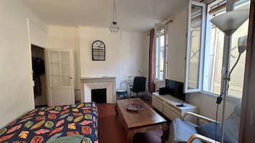 1 bedroom, desk, iron/ironing board, travel crib