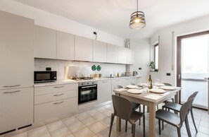 Fridge, microwave, oven, stovetop - Elegant & Spacious Two-Storey Penthouse in NoLo (Milano)