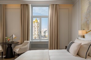 Suite superior | Ropa de cama de alta calidad y minibar