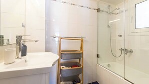 Shower, hair dryer, soap, shampoo