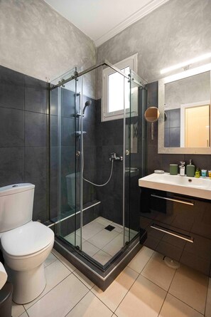 Shower, hair dryer, soap, shampoo