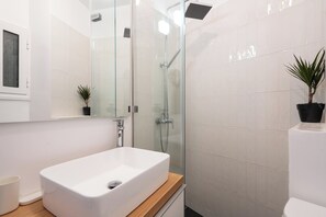 Shower, hair dryer, soap, shampoo