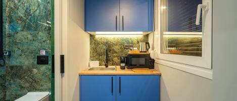Fridge, microwave, coffee/tea maker, electric kettle