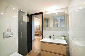 Shower, hair dryer, soap, shampoo
