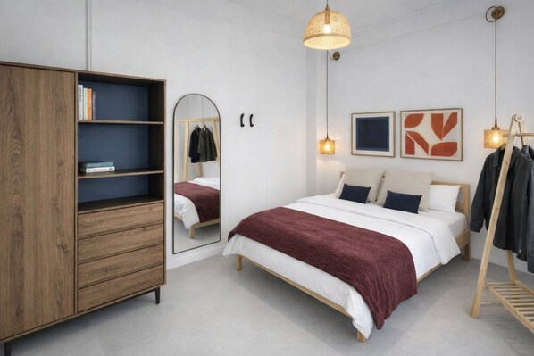 1 habitación y tabla de planchar con plancha 