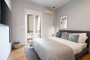 2 habitaciones y tabla de planchar con plancha 