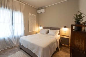 2 habitaciones y tabla de planchar con plancha 
