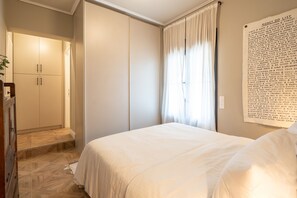 2 habitaciones y tabla de planchar con plancha 