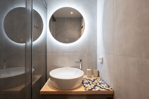 Shower, hair dryer, soap, shampoo