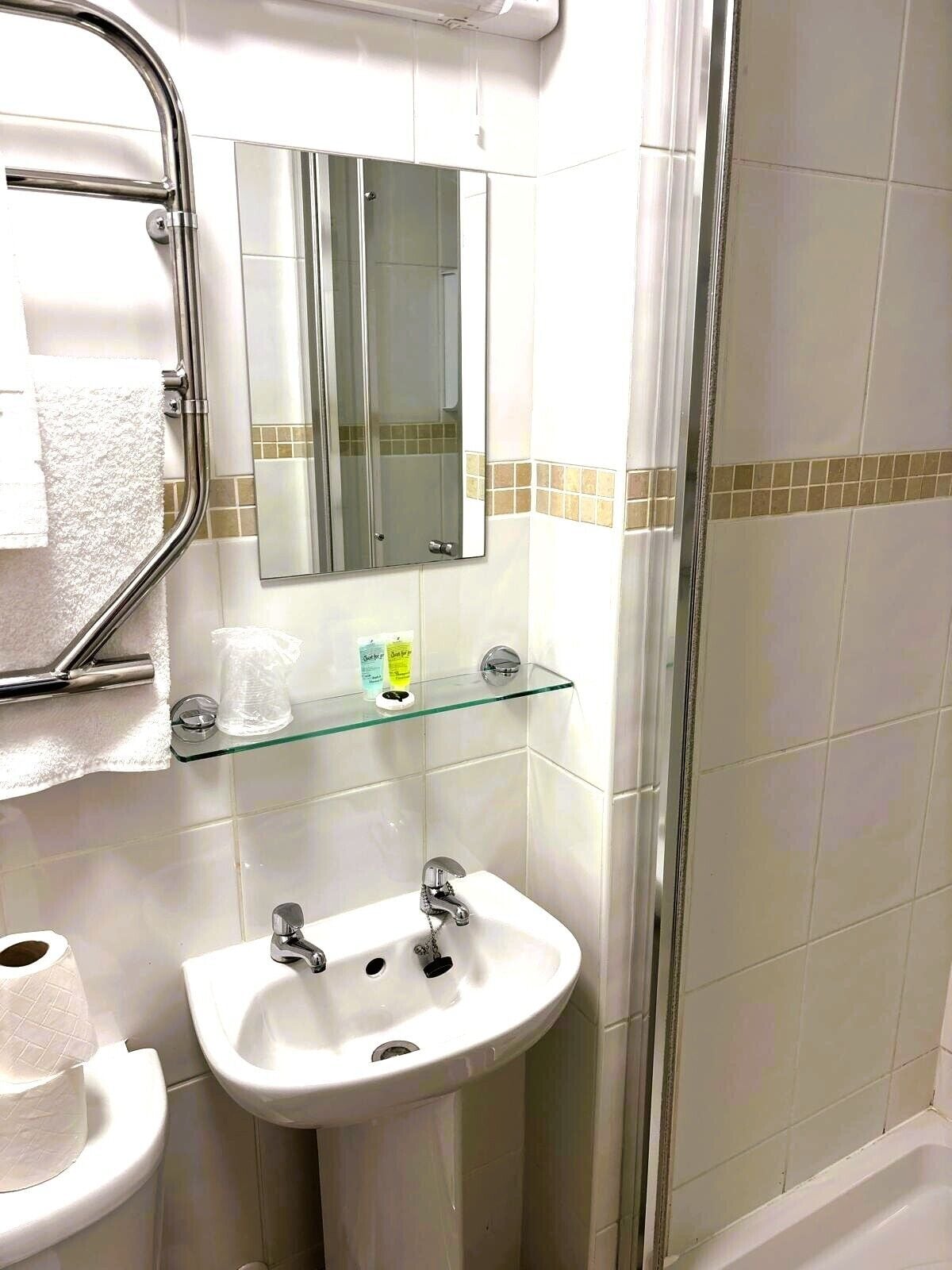 Shower, towels, soap, shampoo