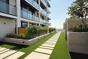 Property grounds - Brand New 1-BHK in JVC | Huge Balcony | Fully Eqpt (Dubai)