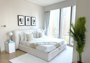 2 chambres, coffres-forts dans les chambres, fer et planche à repasser