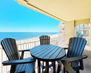 Outdoor dining - Luxe 4BR Beachfront Condo, Insane Gulf Views, Infinity Pool, Indoor Pool/Hot Tub (Orange Beach)