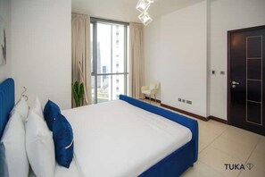 1 chambre, coffre-fort, bureau, fer et planche à repasser