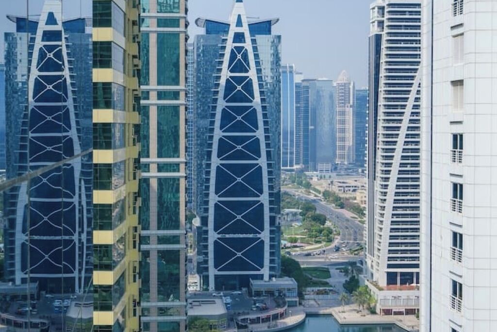 A high-rise building with a distinctive triangular design and multiple balconies.