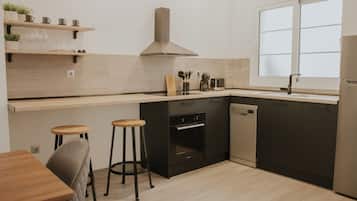 Departamento Deluxe, vista a la ciudad | Cocina privada