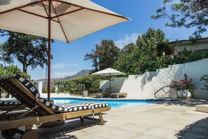 Outdoor pool - Tranquil Garden Cottage with Stunning Vineyard-to-Mountain Views (Cape Town)