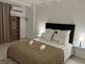 2 habitaciones, tabla de planchar con plancha, wifi y ropa de cama 