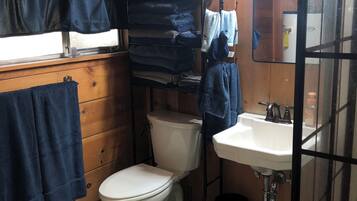 Hair dryer, towels, soap, toilet paper