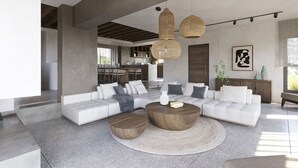 A modern living room with a sectional sofa, round wooden coffee table, and hanging rattan light fixtures. - Villa Aether Stelida Naxos (Naxos)