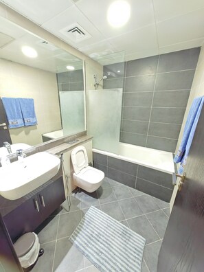 Hair dryer, bidet, towels, soap