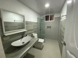 Shower, hair dryer, towels, soap