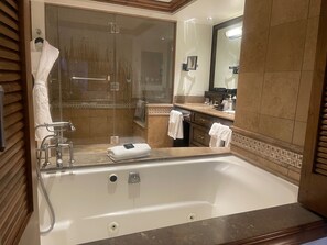 Jetted tub, hair dryer, towels, soap