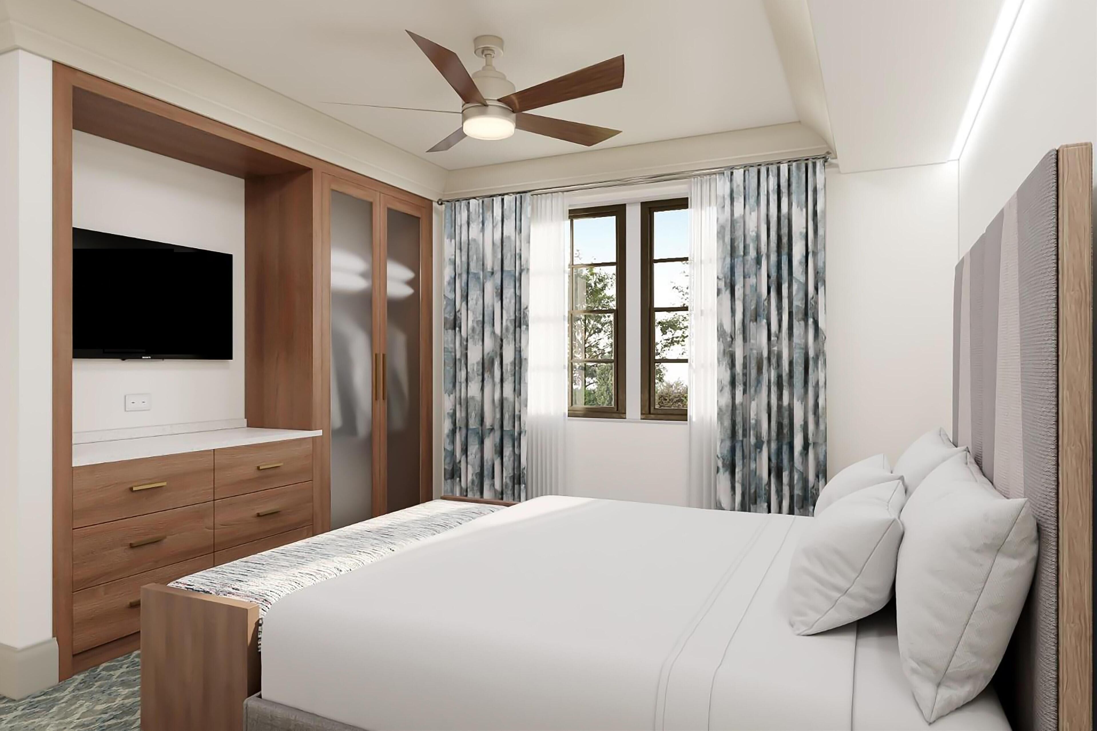 Luxe beddengoed, een kluis op de kamer, een strijkplank/strijkijzer