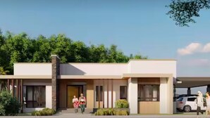 A modern two-story house with a flat roof, large windows, and a covered driveway. - 5BR House with Centralized AC, Backyard & Office (Roxas City)