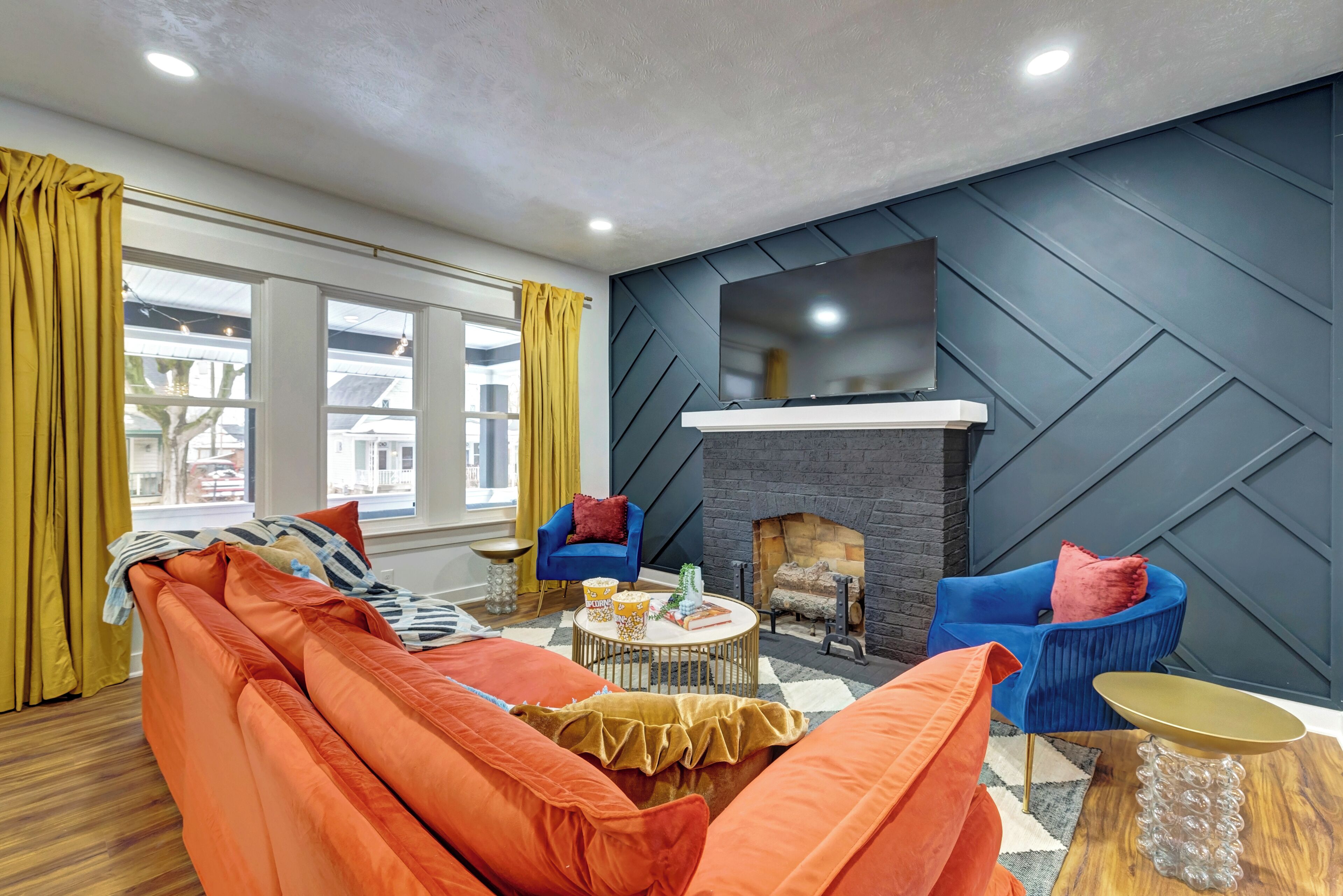 Smart TV, fireplace, foosball, books