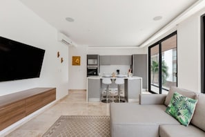 Appartement, 2 chambres | Aire de séjour | Téléviseur à écran plat