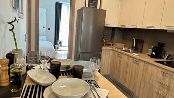 Fridge, oven, coffee/tea maker, toaster