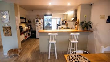 Fridge, microwave, oven, cookware/dishes/utensils