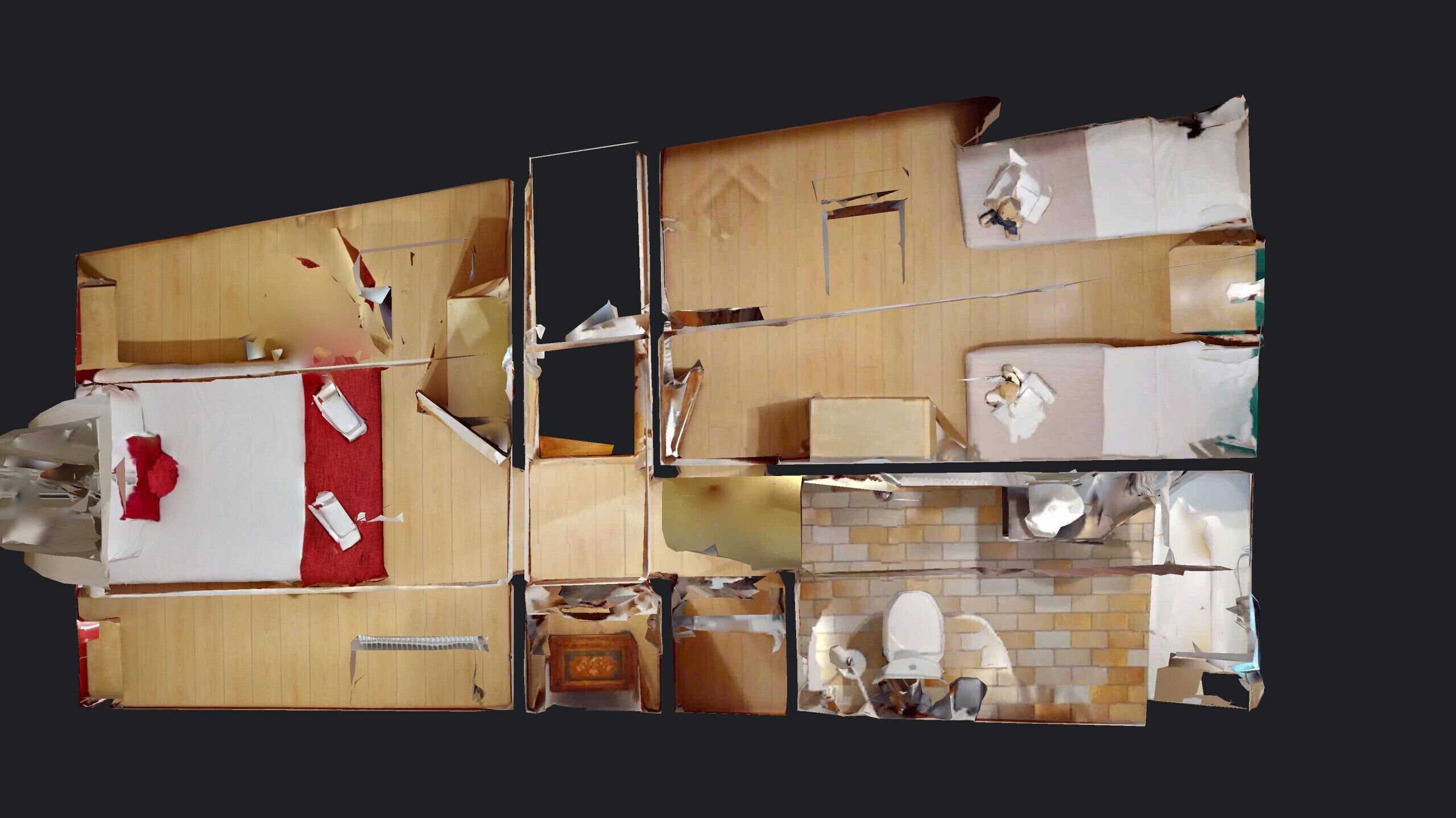 Un immeuble à plusieurs niveaux comprenant différents locaux et espaces communs, notamment une cuisine, une salle de bain et des pièces à vivre.