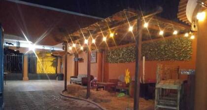 Casa Grande 4-bedroom house with adjacent lot as the patio, WiFi, AC pool table