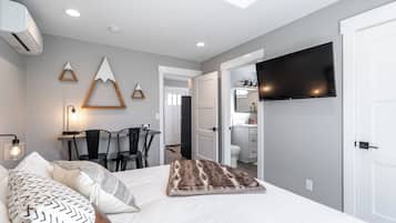 1 bedroom, desk, iron/ironing board, travel crib
