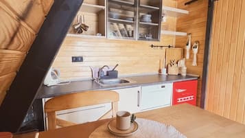 Bungalow tiện nghi đơn giản, quang cảnh vườn | Bếp riêng