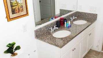 Hair dryer, towels, soap, shampoo