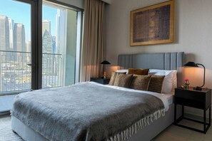 4 chambres, coffres-forts dans les chambres, fer et planche à repasser