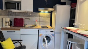 Microwave, stovetop, coffee/tea maker, electric kettle