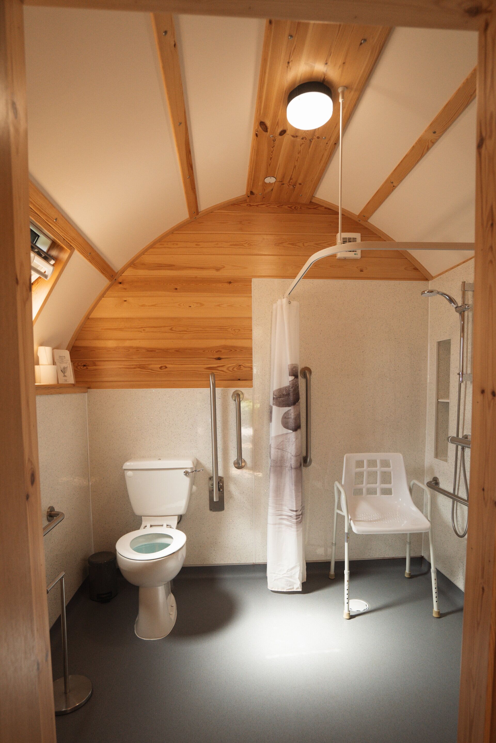 Shower, towels, soap, toilet paper