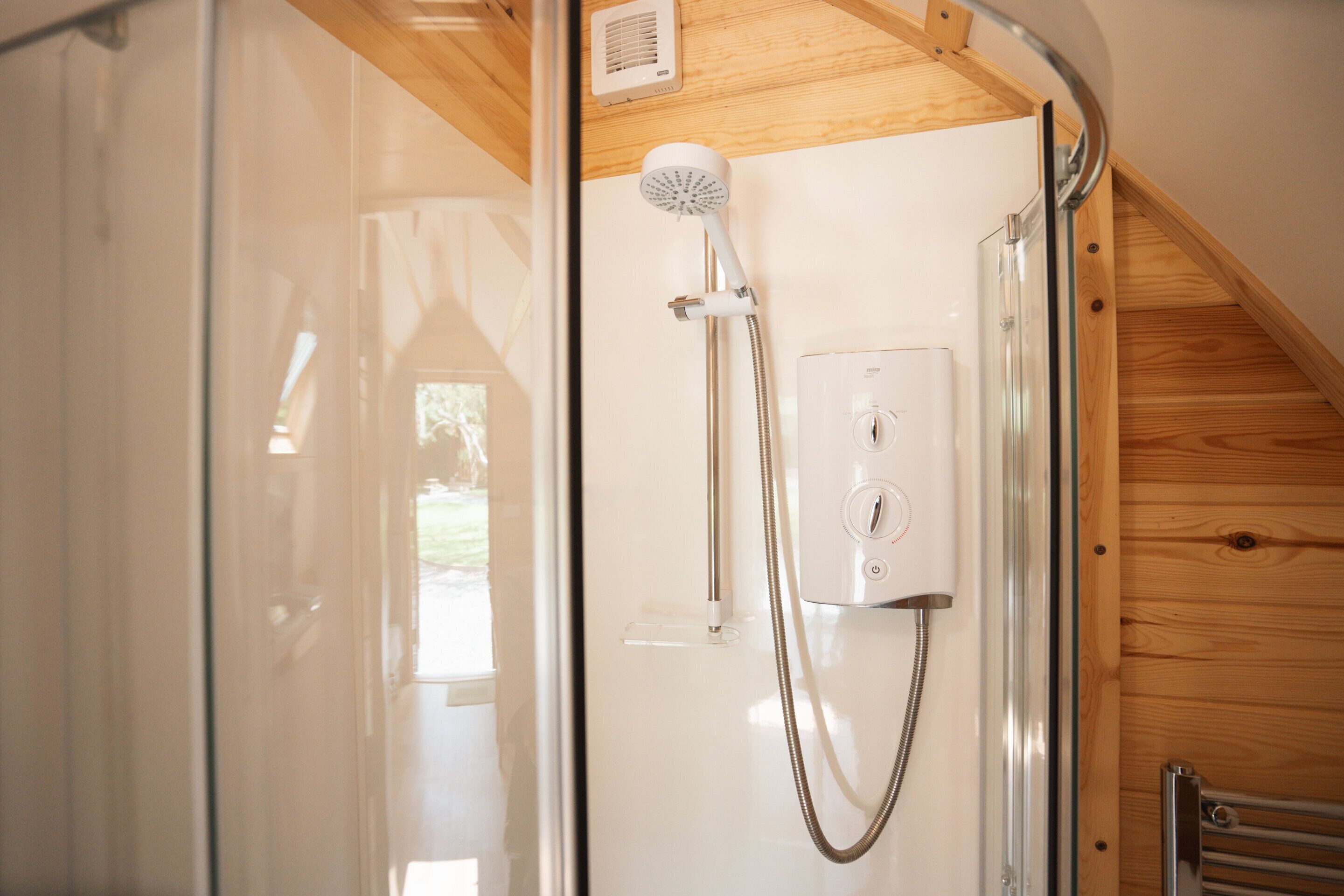 Shower, towels, soap, toilet paper