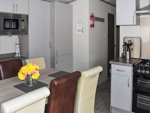 Private kitchen - This lovely caravan is perfect for couples, friends, or families. (Sandown)