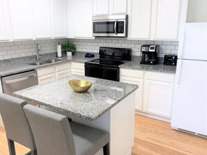 Fridge, microwave, oven, stovetop - Elegant French Country - Apt A (Muskegon)