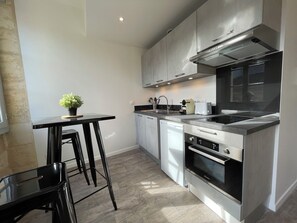 Fridge, microwave, oven, coffee/tea maker