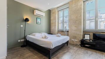 1 chambre, fer et planche à repasser, Wi-Fi, draps fournis