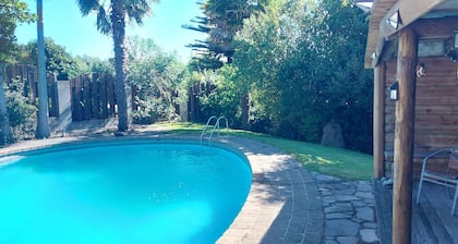 Haleys cabin. Bedroom with Queen bed and ensuite only. Superb Pool & cabana.